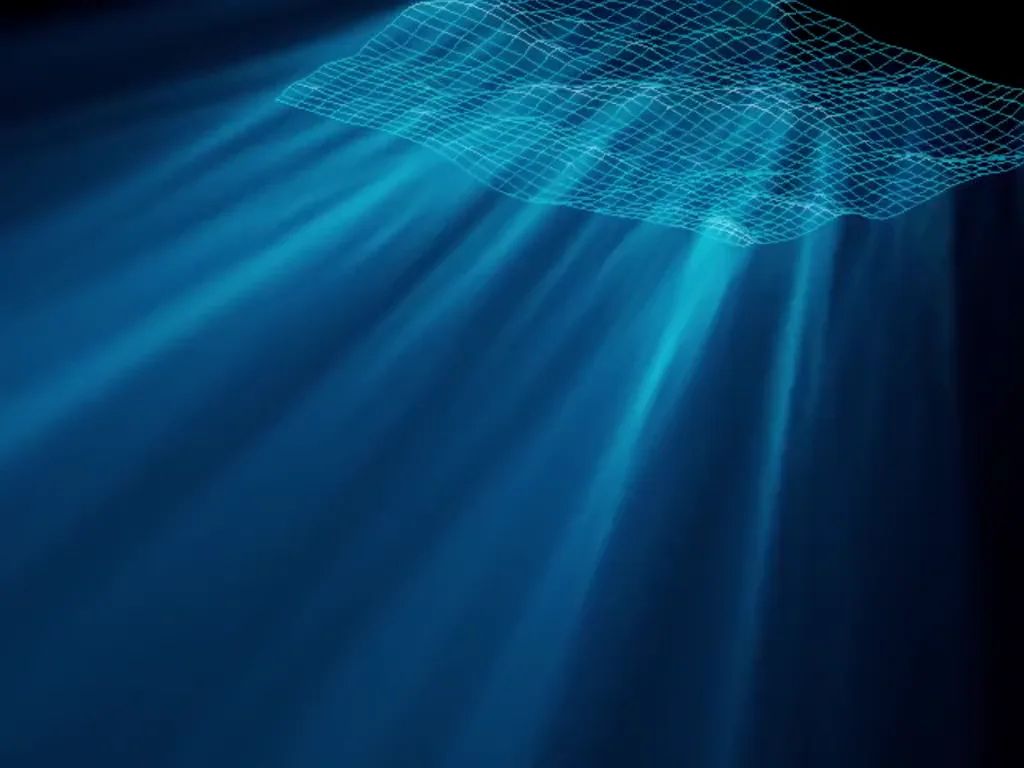 Rayons de soleil bleus sous l’eau, tombant d’une surface océanique en fil de fer
